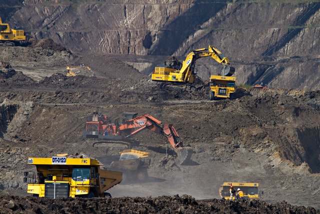 mining trucks excavating