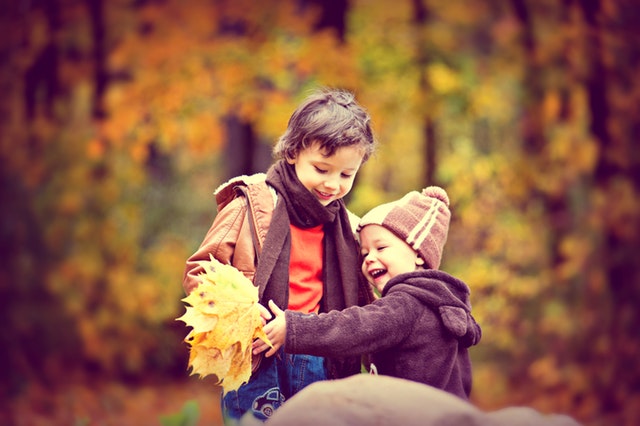 two kids playing together